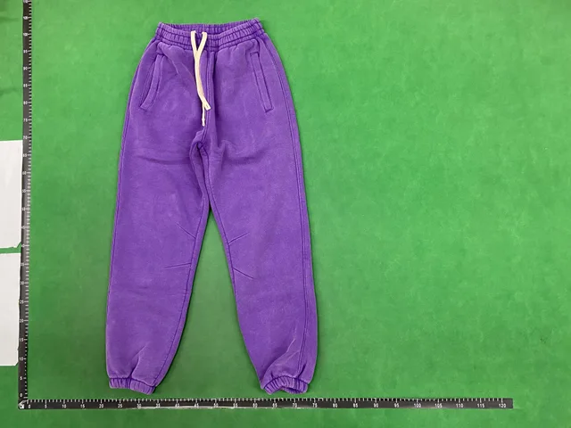 Purple drawstring trousers — single-product front QC photo