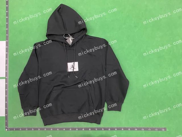 Black pullover hoodie — single-product front QC photo