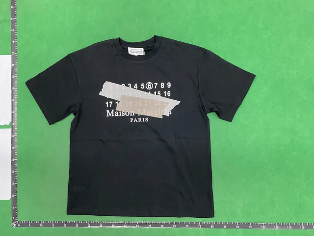 Black printed T-shirt — single-product front QC photo
