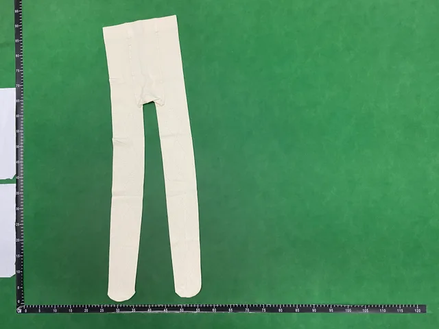 Cream trousers — single-product front QC photo