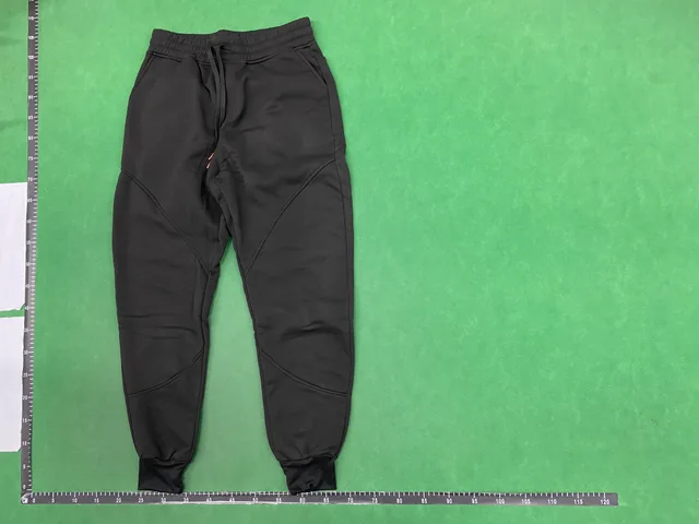Black drawstring trousers — single-product front QC photo